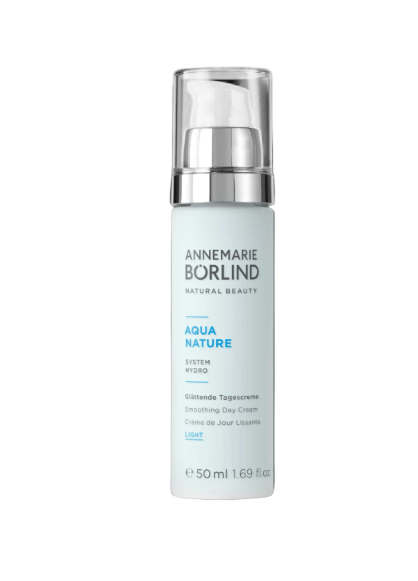 Skincare bottle with 'Annemarie Borlind' branding on a black background