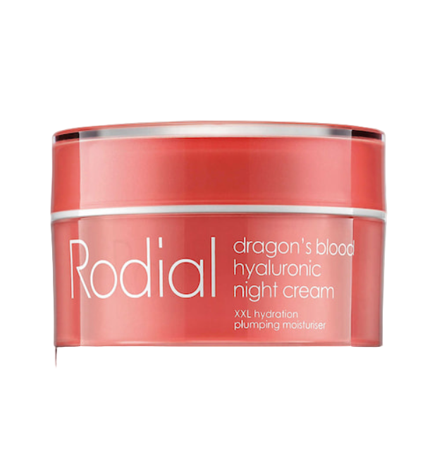 Red jar of Rodial dragon's blood hyaluronic night cream on a light gray background