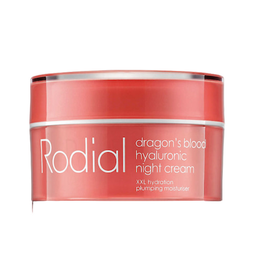 Red jar of Rodial dragon's blood hyaluronic night cream on a light gray background