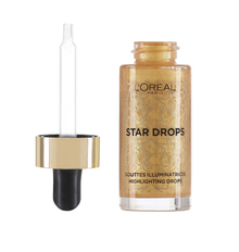 L'Oréal Paris Glitter Fever Highlighting Drops in Warm Gold delivering a luminous glow with a smooth, blendable liquid formula.