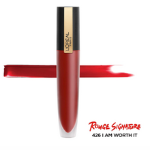 L'Oréal Rouge Signature Liquid Lipstick in shade 115 I Am Worth It shown with the tube open, highlighting the precision applicator and lightweight liquid matte formula.