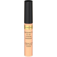 Max Factor Facefinity All Day Flawless Concealer in shade 010 shown with its applicator, highlighting the creamy liquid formula for precise and even application.