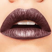 Maybelline Metallic Foil Liquid Lipstick in shade 120 Nemesis applied on lips, highlighting its bold metallic color, smooth application, and reflective foil finish.