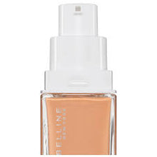 Close-up of Maybelline Superstay 24H Liquid Foundation in shade 58 True Caramel showcasing the pump dispenser and creamy liquid foundation texture.
