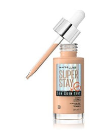 Maybelline SuperStay Glow Tint in shade 30 NU shown with the cap removed, highlighting the lightweight skin tint and easy-to-use bottle design.