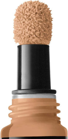 NYX Professional Makeup Born To Glow Concealer in 10.3 Neutral Buff providing smooth, blendable coverage with a natural luminous finish.