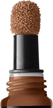 NYX Professional Makeup Born To Glow Concealer in 17 Cappuccino providing smooth, blendable coverage with a natural luminous finish.