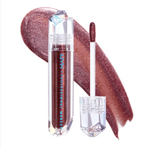 NYX Professional Makeup Diamond & Ice Lip Topper in shade 01 Power Trip shown with the applicator removed, highlighting its glitter-infused formula for precise application.