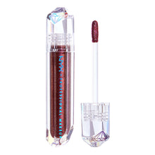 NYX Professional Makeup Diamond & Ice Lip Topper in shade 01 Power Trip displayed in its tube, featuring a shimmering lip topper for adding sparkle to the lips.